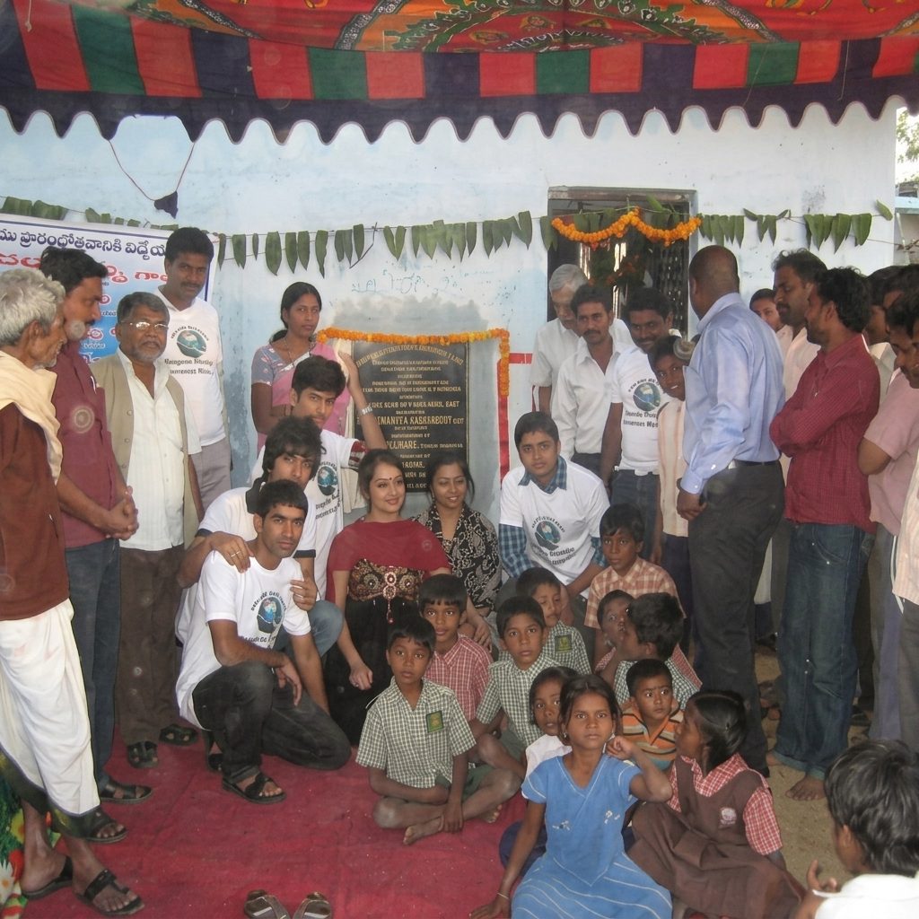 Community gathered at water plant inauguration in India